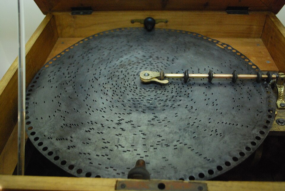A disc music box mechanism - the pin-and-comb system Bjork commissioned in transparent acrylic for Vespertine